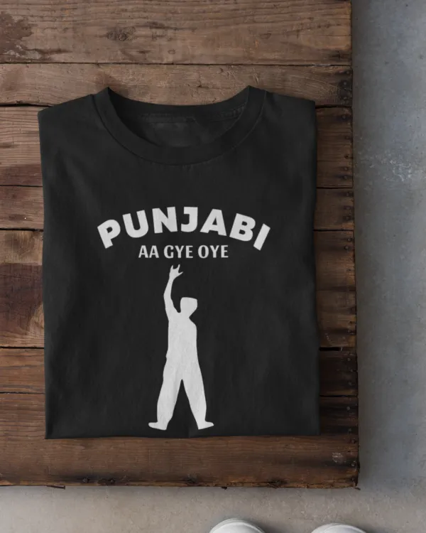 folded-tee-mockup-against-a-wooden-surface-33685 (1) Punjabi Aa Gye Oye Black Unisex T-Shirt