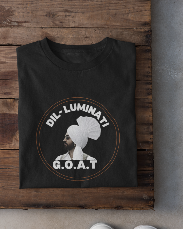 folded-tee-mockup-against-a-wooden-surface-33685 (7) Dil-Luminati G.O.A.T Unisex T-Shirt