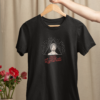 mockup-of-a-woman-s-hand-holding-a-hanger-with-a-t-shirt-over-a-table-with-flowers-m23501 (10) Dil-Luminati Unisex T-Shirt