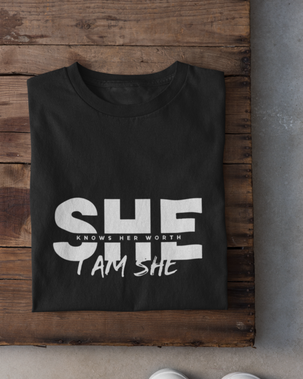 folded-tee-mockup-against-a-wooden-surface-33685 (7) She Knows Her Worth I Am She Woman's T-Shirt