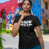gildan-t-shirt-mockup-featuring-a-woman-with-a-thoughtful-look-in-the-street-m39125 She Knows Her Worth I Am She Woman's T-Shirt