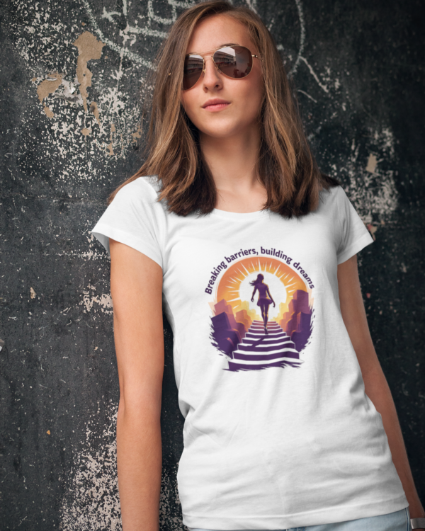 mockup-of-a-young-woman-wearing-a-t-shirt-and-leaning-against-an-urban-wall-2759-el1 Breaking Barriers, Building Dreams Women's T-Shirt