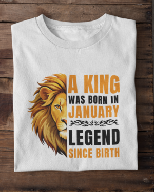 folded-tee-mockup-against-a-wooden-surface-33685 (12) A King Was Born in January: Legend Since Birth Unisex T-Shirt