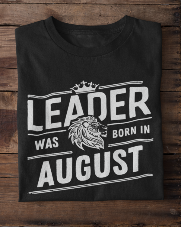 folded-tee-mockup-against-a-wooden-surface-33685 (7) Leader Was Born in August Unisex T-Shirt