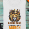 mockup-of-a-folded-t-shirt-featuring-halloween-decor-items-m100 (2) A King Was Born in March Unisex T-Shirt