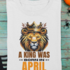 mockup-of-a-folded-t-shirt-featuring-halloween-decor-items-m100 (3) A King Was Born in April Unisex T-Shirt