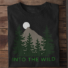folded-tee-mockup-against-a-wooden-surface-33685 (18) Into The Wild T-Shirt – For Nature Lovers & Free Spirits