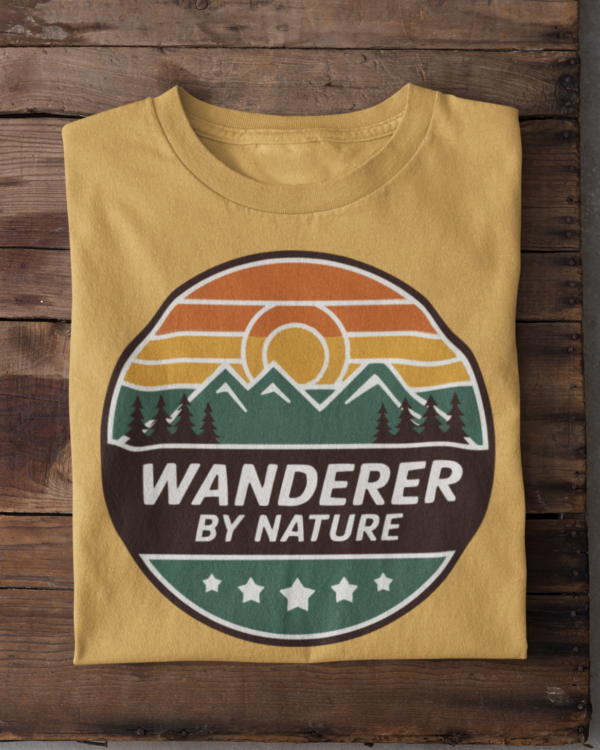 Wanderer by Nature T‑Shirt (Retro Travel Badge – Beige)