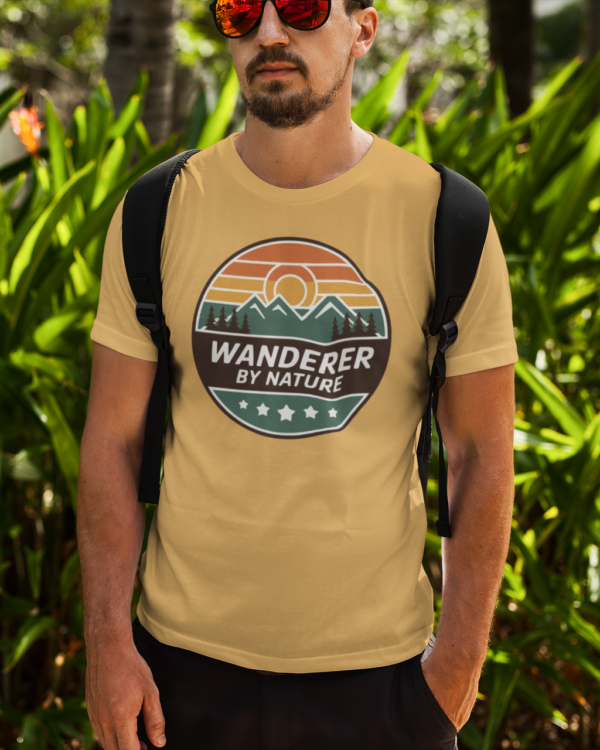 Wanderer by Nature T‑Shirt (Retro Travel Badge – Beige)