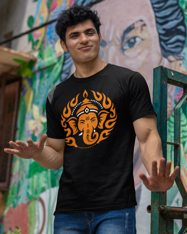 gildan-t-shirt-mockup-of-a-man-standing-in-front-of-a-painted-wall-m39287 Ekadanta Unisex T-shirt | Lord Ganesha Inspired Spiritual T-shirt